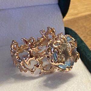 rose gold and aquamarine ring.